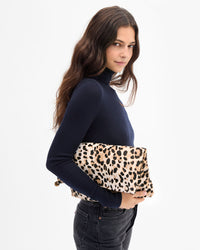 Marie holding Carryall Clutch