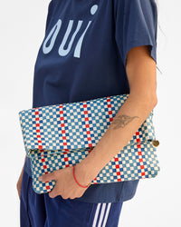 Gia holding Carryall Clutch