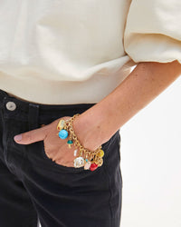 Cabachon Charm Shown on the Charm Chain Bracelet with the Yellow Stone Bead Charm, Rattan Egg Charm, Fraise Charm, Turquoise Petit Heart Charm, Freshwater Pearl Mini Heart Charm, Mushroom Charm, Turquoise Stone Bead Charm, and the CV x EMC Heart Locket Charm