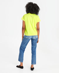 back view of mecca in the  Neon Yellow w/ Ciao Classic Tee