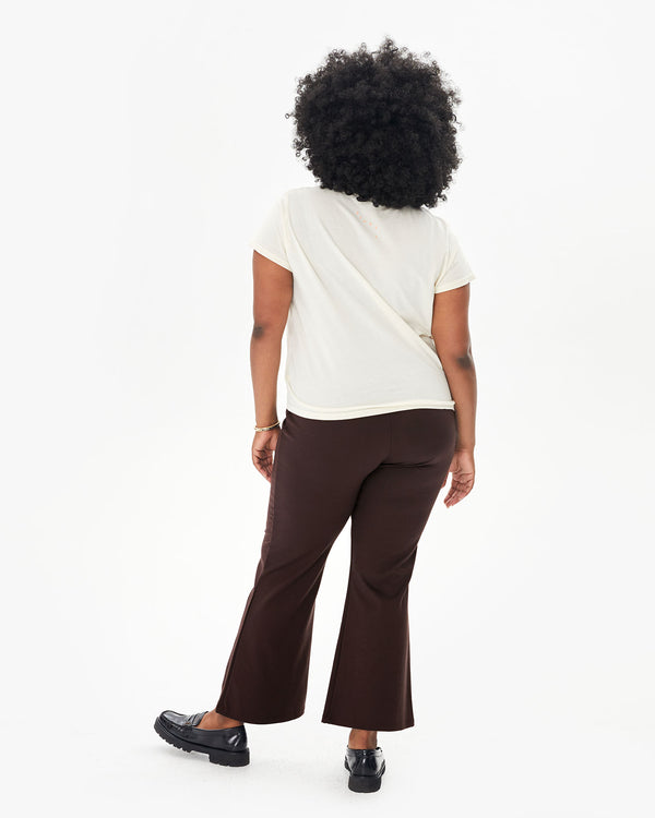 back view of candice in the Chocolate Ponte Le Flare with a cream classic tee