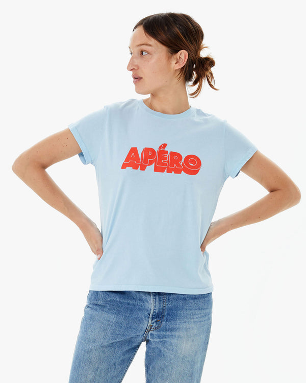 Zoe wearing the Light Blue Apéro Classic Tee with jeans. her hands are on her hips