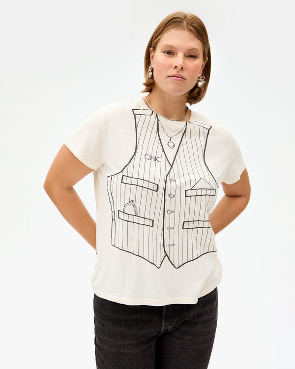 Sonnie wearing the Cream Trompe l’oeil Vest Classic Tee with black jeans