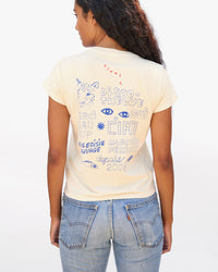 back view of Jade wearing the Cream Cream Bourgeoisie Sauvage Classic Tee