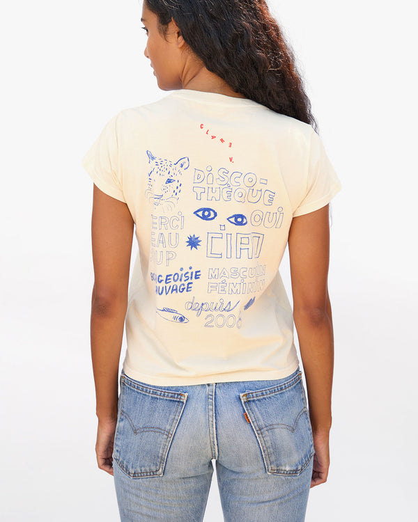 back view of Jade wearing the Cream Cream Bourgeoisie Sauvage Classic Tee