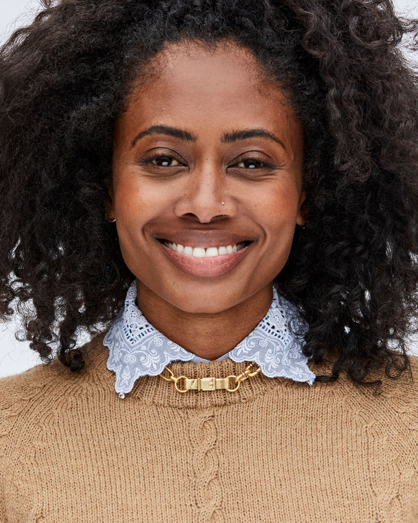Mecca Wearing the Convertible Chain Necklace as a Choker with the Belt Detail Facing Foreward