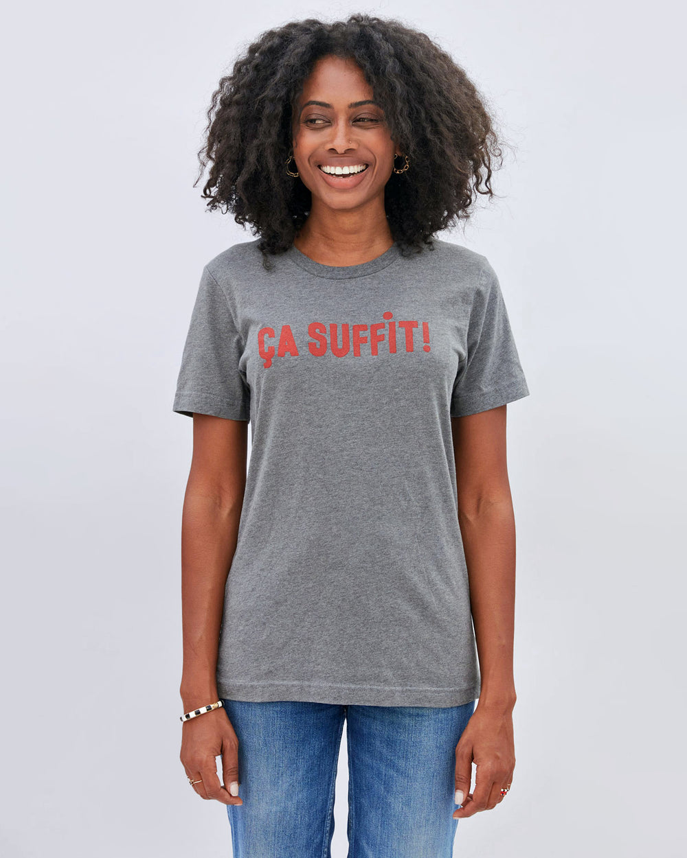 Mecca wearing the Ca Suffit Original Tee untucked with denim jeans. 