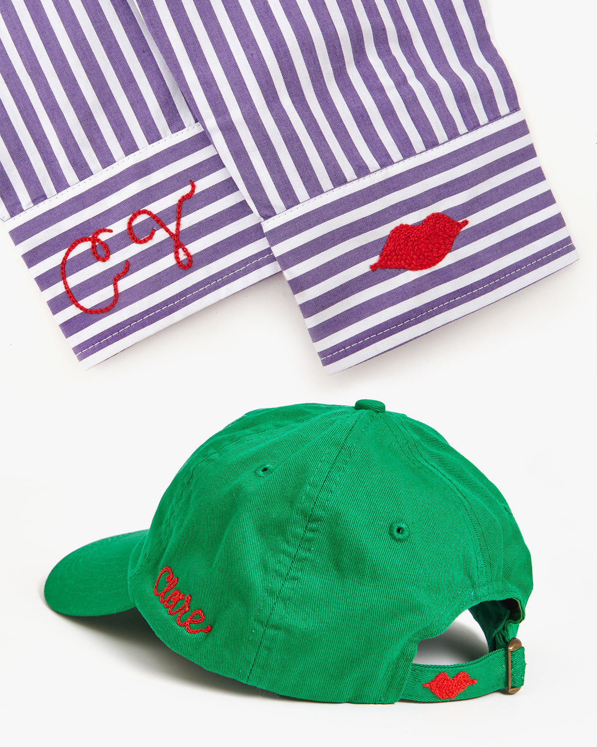 Striped shirt with embroidery monogram on both cuffs and a Baseball Hat with embroidery on the side and back. 