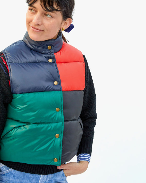 Danica wearing the Colorblock Émile Vest fully snapped up with her hand in her jeans pocket