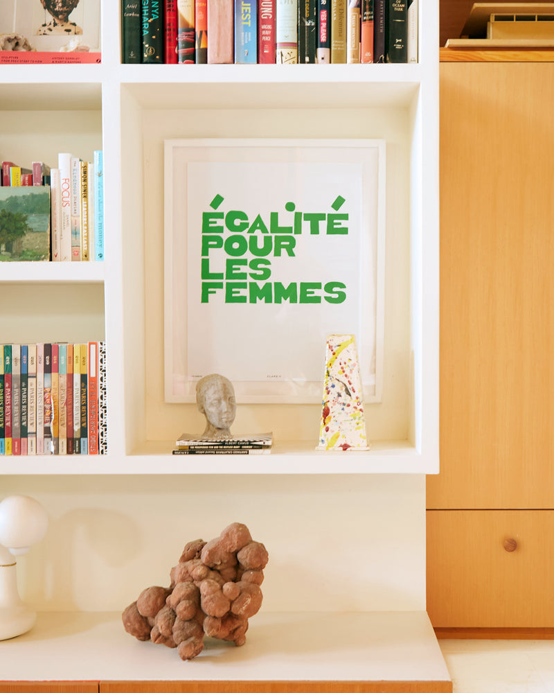 Clare V. x Framebridge Ègalité Pour Les Femmes print in a room cubby.