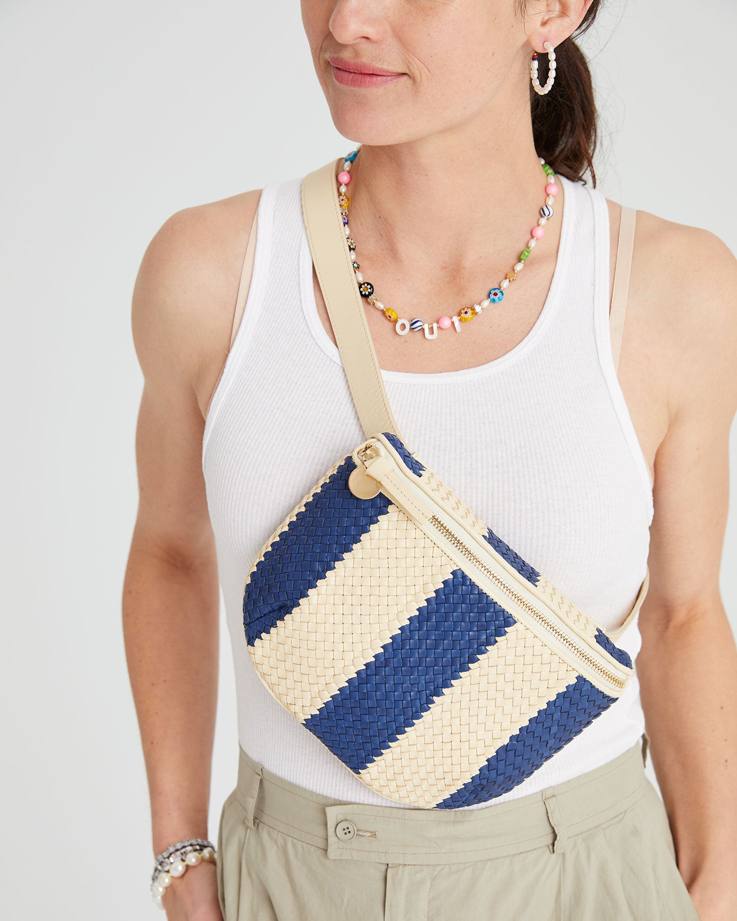 danica wearing the Indigo & Cream Woven Racing Stripes Fanny Pack around her chest