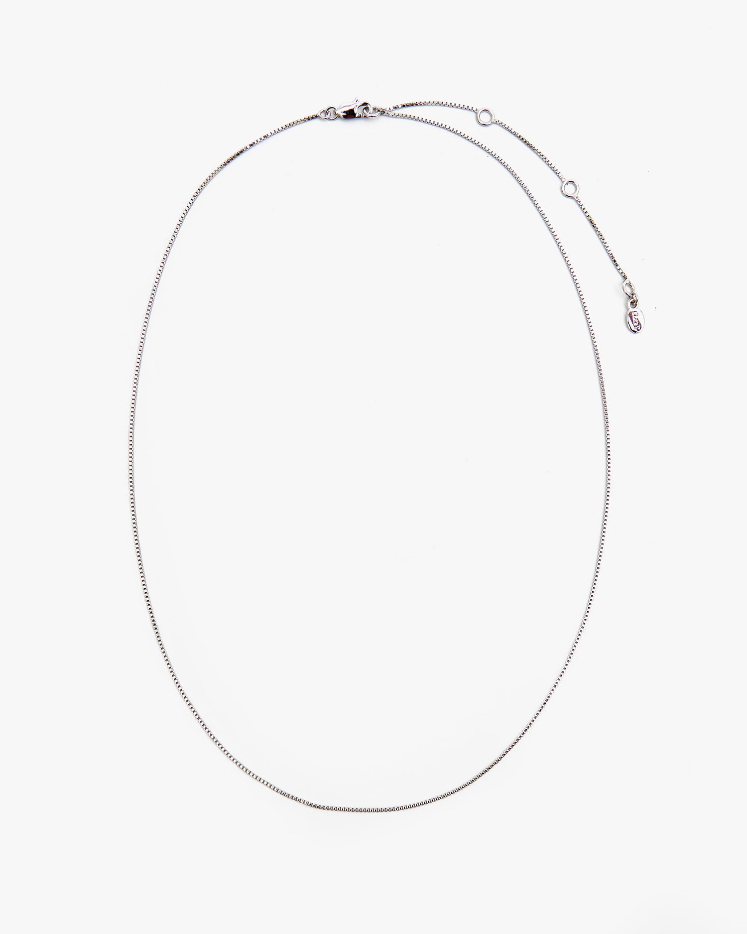 flat image of the  Sterling Silver Fine Box Chain Necklace showing the extender portion of the chain