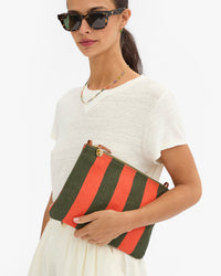 Marie holding Flat Clutch w Tabs
