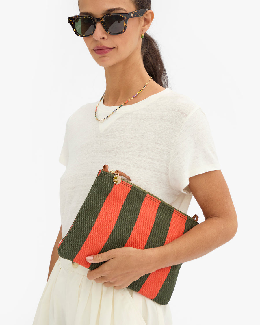 Marie holding Flat Clutch w Tabs