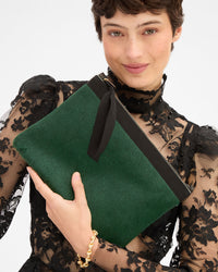Nike holding Flat Clutch w Tabs