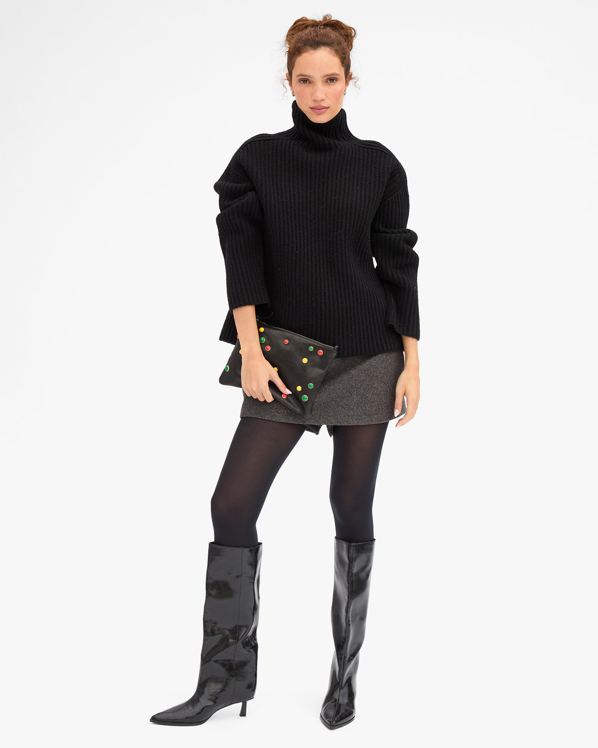 Laura holding Flat Clutch w Tabs