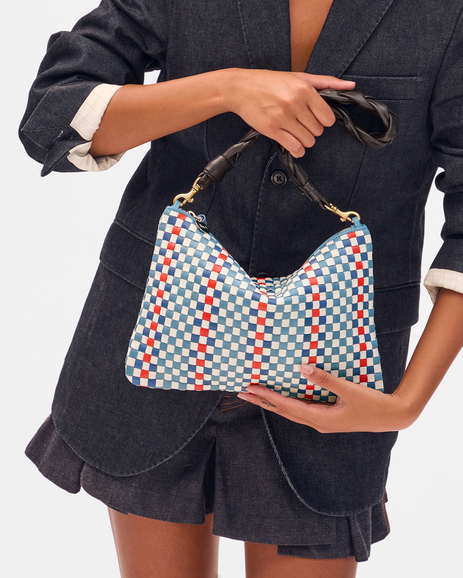 Lizzy holding Flat Clutch