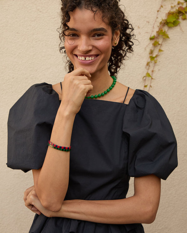 Haro wearing the navy and poppy and emerald and black Glass Beaded Stretch Bracelets