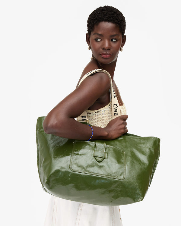 Mouna holding Grande Bateau Tote