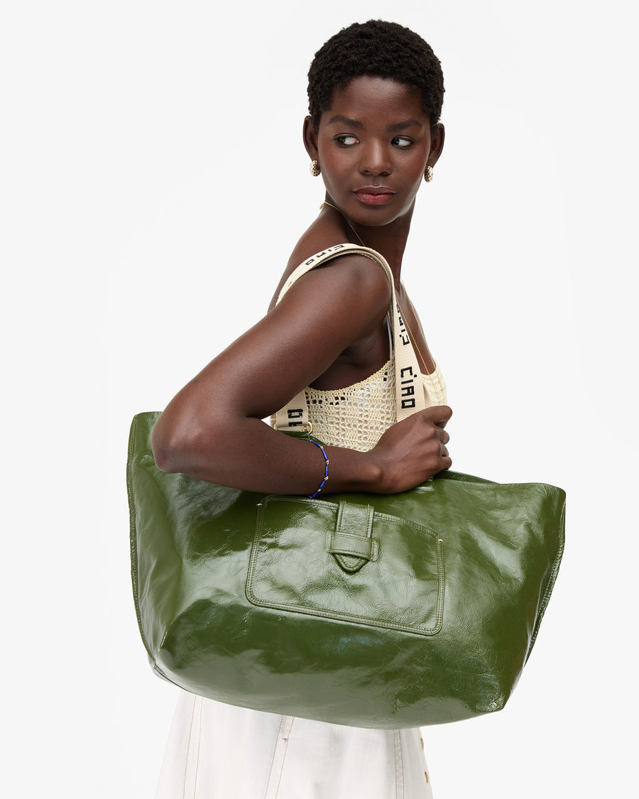Mouna holding Grande Bateau Tote
