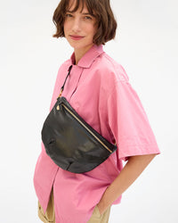 Model carrying the Black Nouveau across her chest. 