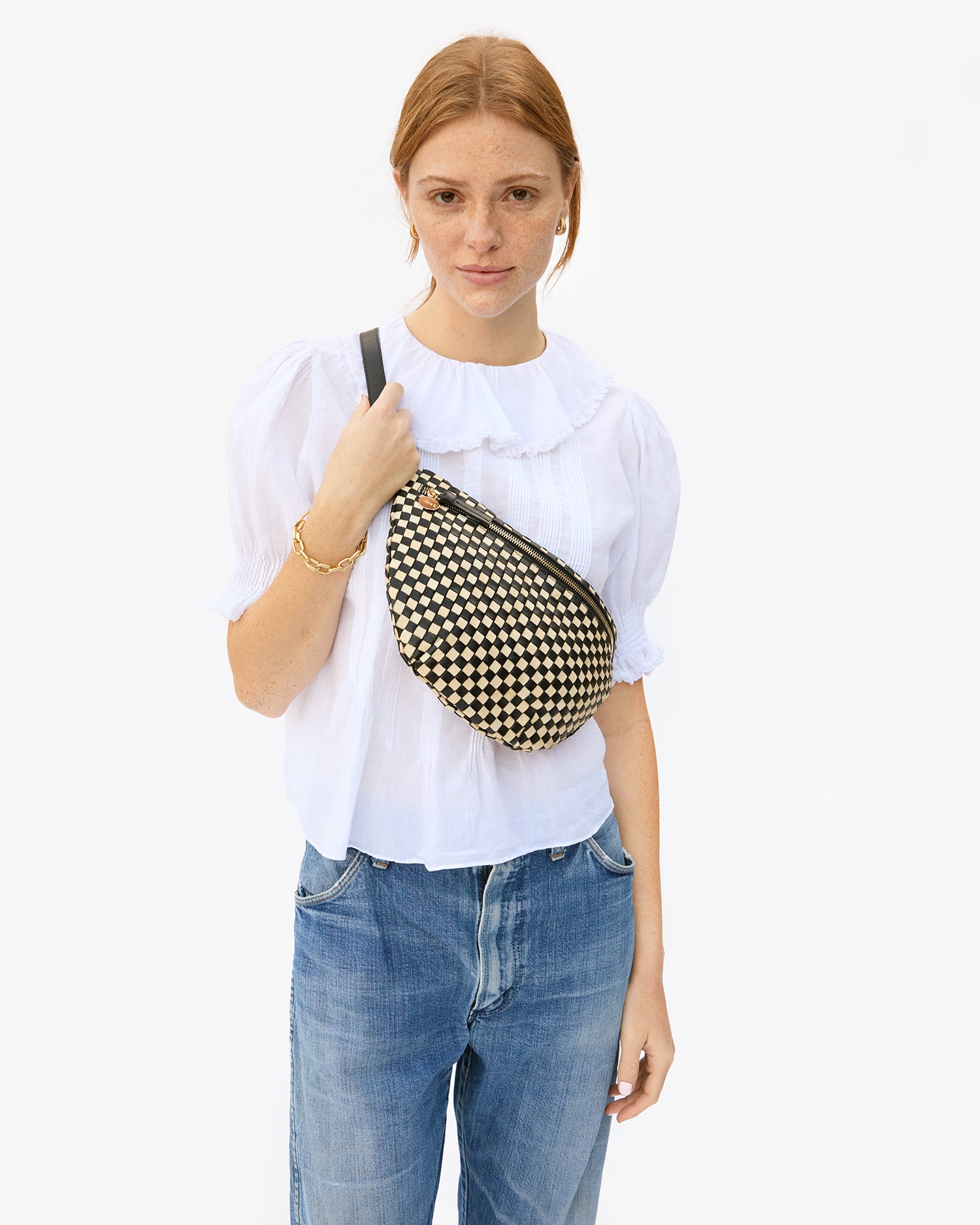 Haley Wearing the Black and Cream Woven Checker Grande Fanny as Crossbody