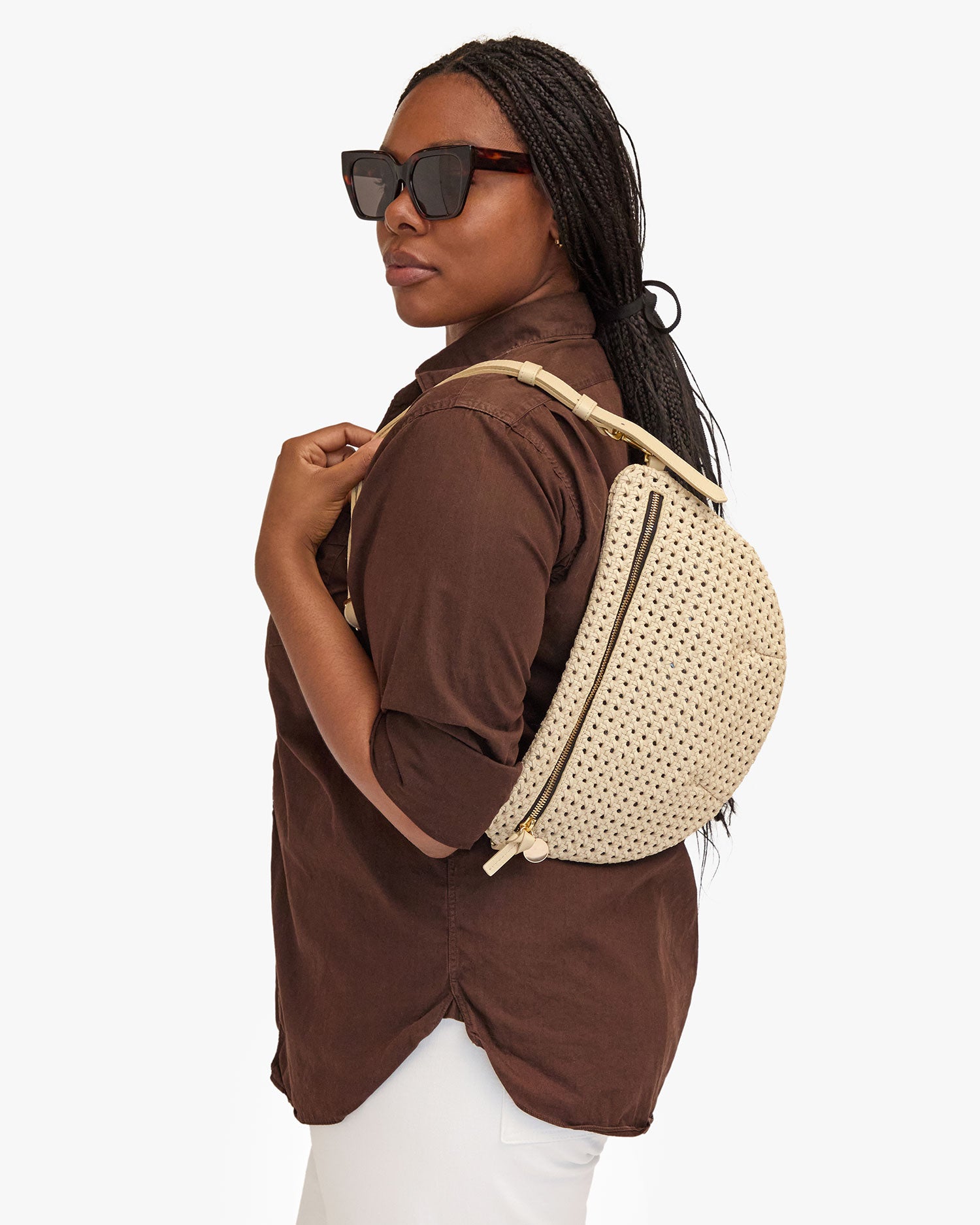 Candice wearing the Cream Rattan Grande Fanny as a Shoulder Bag