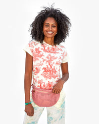 Mecca wearing the Classic Tee in Cream w/ Bright Poppy St. Calais Toile with the unlined Petal Rattan Grande Fanny around her waist.