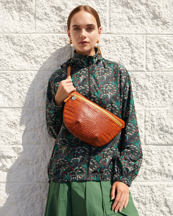Lillian wearing the Cuoio Croco Grande fanny across her chest