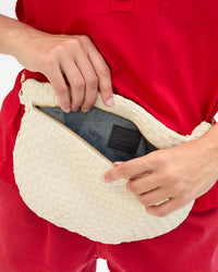 Kathie shows an interior view of the Kathie wears the Grande Fanny in Cream Woven Checker