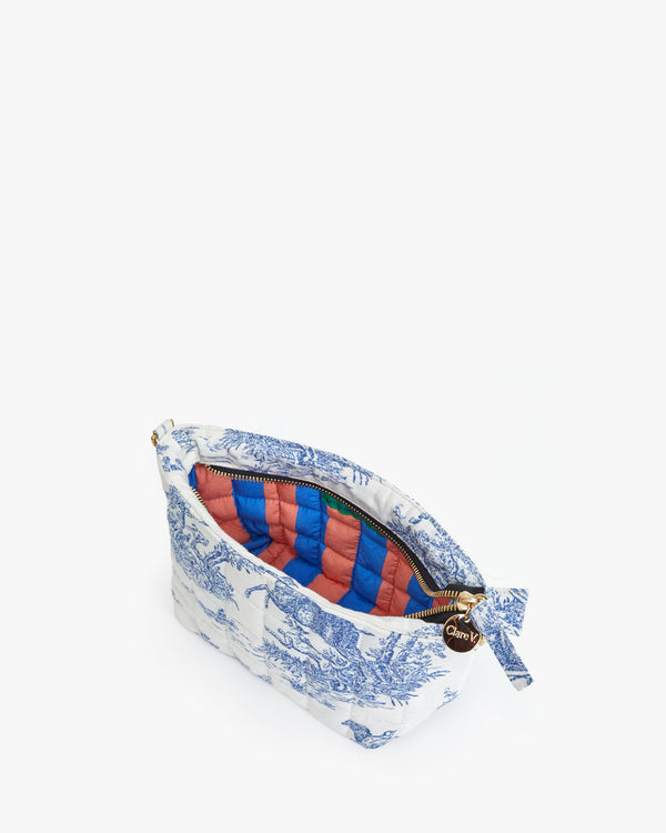 St. Calais Blue Quilted Linen Toile Pochette shown unzipped.