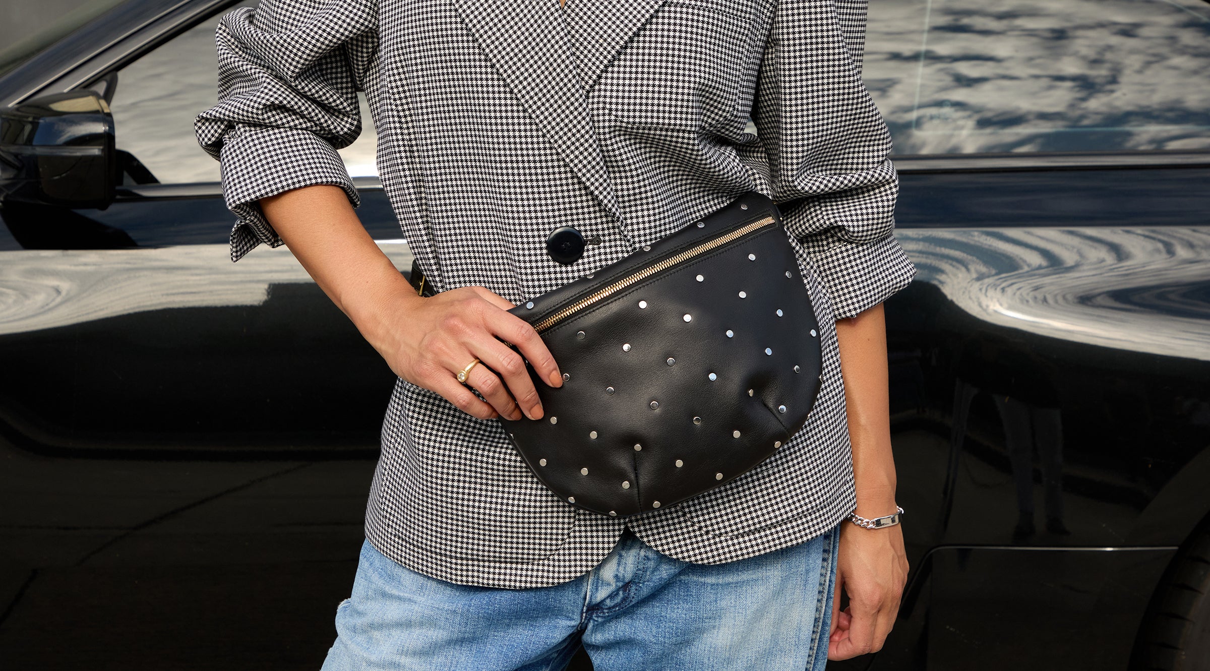 Model wearing the Black with Studs Grande Fanny around her waist. 