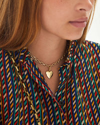 Aurelia wearing the 14k Gold Vermeil Heart Charm on the charm chain necklace