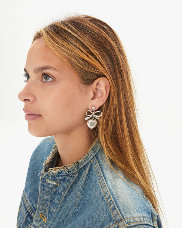 Aurelia wearing the Silver Heart Drop Earrings