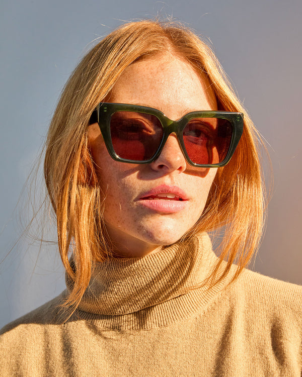 Haley wears the Heather Sunnies in Loden