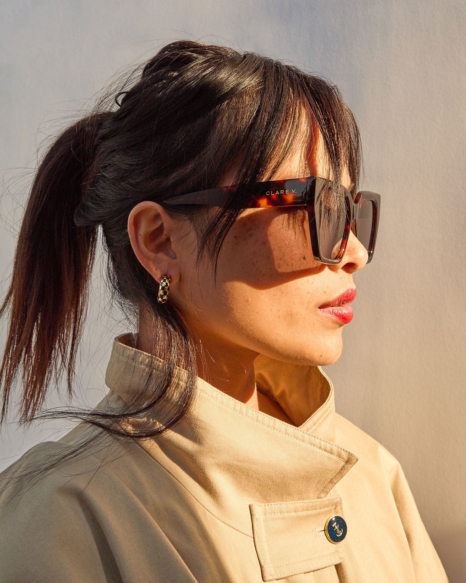 Profile View of Maly wearing the Heather Sunnies in Tortoise