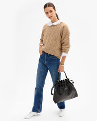 Marie holding Henri top handle