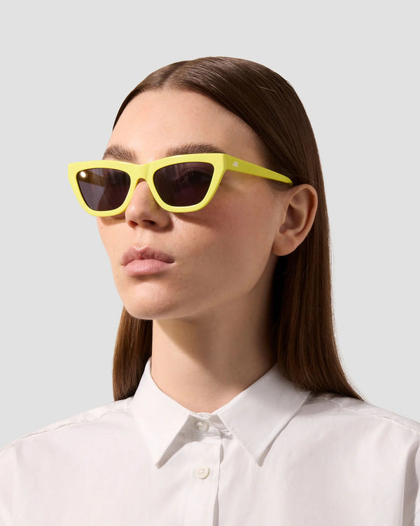 model wearing the JB Sun The Cateye Sunglasses in lemon