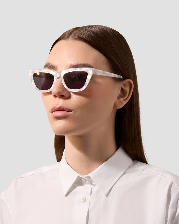 model wearing JB Sun The Cateye Sunglasses in mother of pearl