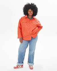 candice wearing the Spruce & Poppy Quilted Nylon Jacque Jacket reversed with the poppy side facing outwards