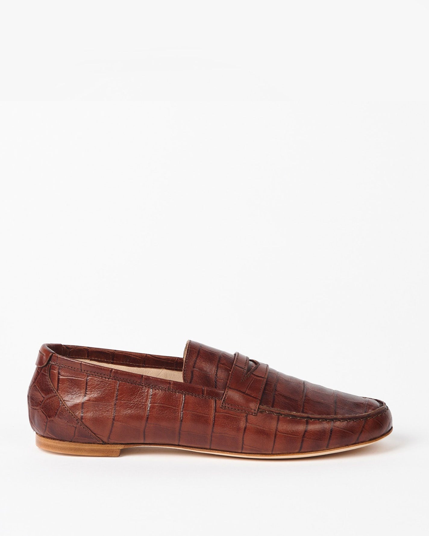 side view of the Jamie Haller Brown Croc Embossed Penny Loafer