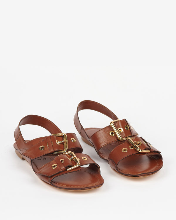 angled view of the Jamie Haller Double Buckle Sandal in Cognac