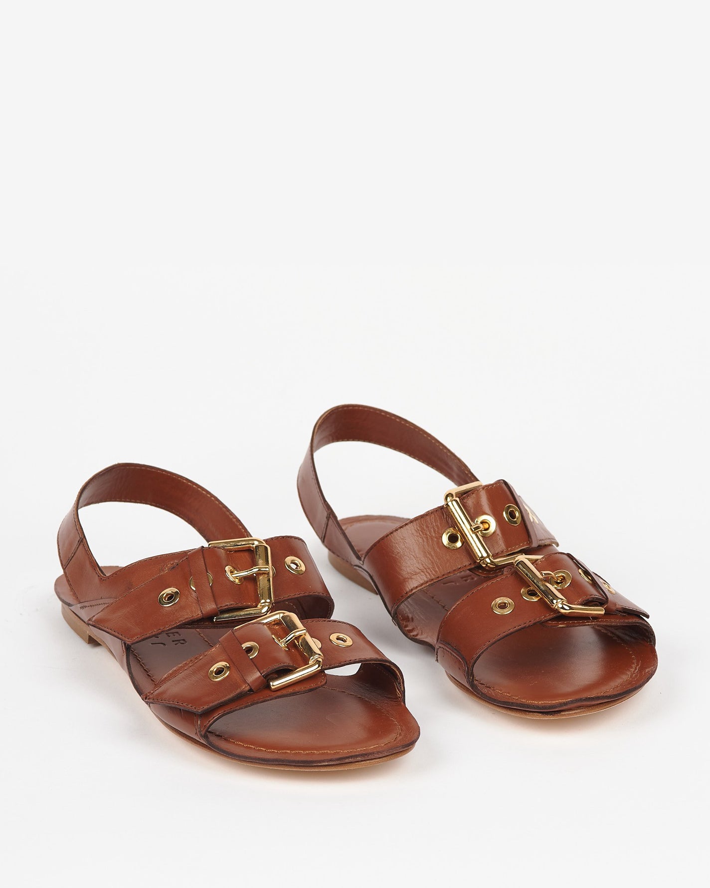 angled view of the Jamie Haller Double Buckle Sandal in Cognac