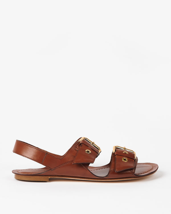 side view of the Jamie Haller Double Buckle Sandal in Cognac