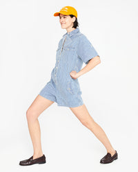 athena doing a lunge in the Engineer Stripe Jumpsuit Cargo 