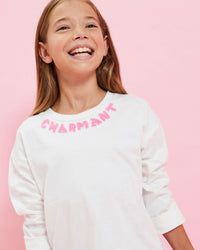 Model wearing the Cream w/ Dusty Pink Charmant Kids Boxy Longsleeve Tee