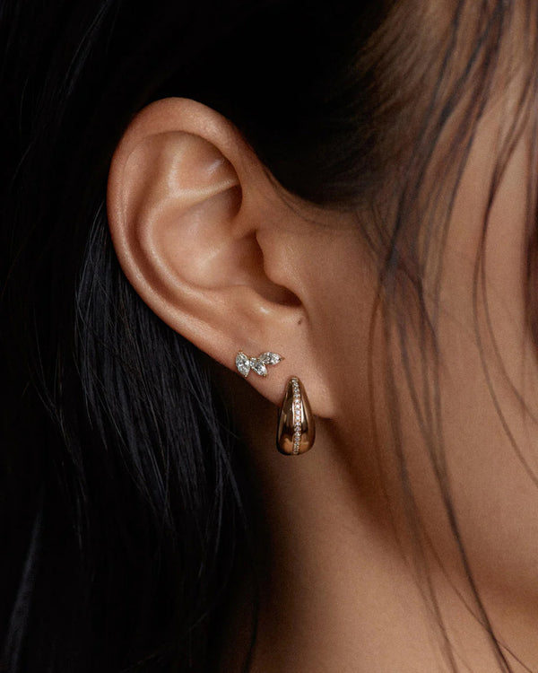 Model wearing the Kinn Studios Pavé Diamond Teardrop Hoops