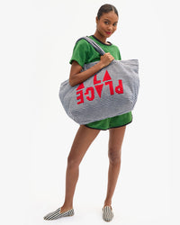 La Plage Tote on Vitoria's shoulder