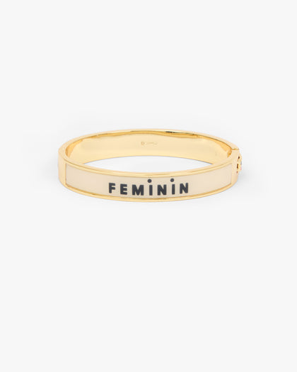 Le Bangle Bracelet showing the other side of the bracelet that reads "FEMININ". 