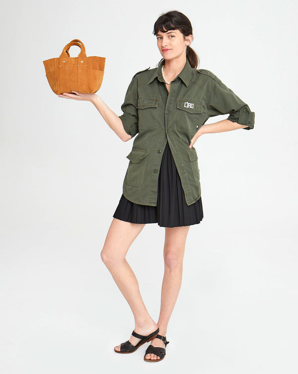 Danica holding the Le Petit Box Tote in Camel Suede on the palm of her hand